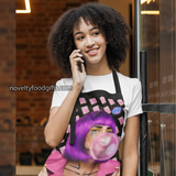 woman-wearing-girl-with-popart-makeup-blowing-bubble-gum-on-poptart-unisex-apron-bubblegum-black-available-from-novelty-food-gifts-dot-com