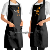 woman-wearing-porkhub-funny-grilling-apron-black-with-bbq-grill-available-from-novelty-food-gifts-dot-com